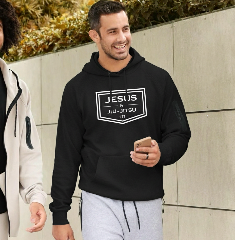 Man wearing black hoodie with JESUS & JIU-JITSU logo