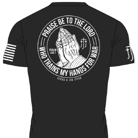 Black rashguard with white graphic design of praying hands and text