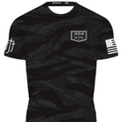 black tiger camo rashguard with JJJ logo on left chest and right shoulder and American flag on left shoulder