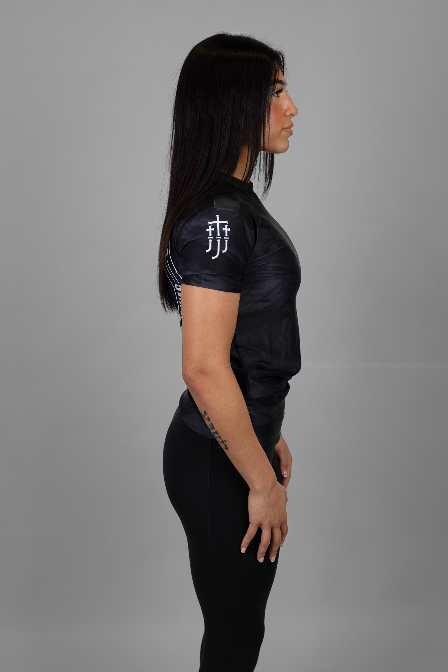 JJJ logo on right shoulder of Black Tiger Camo rashguard