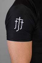 JJJ logo on right shoulder of black rashguard