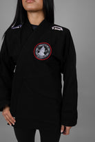 4in Patch with praying hands design and "PRAISE BE TO THE LORD WHO TRAINS MY HANDS FOR WAR" text on a black gi