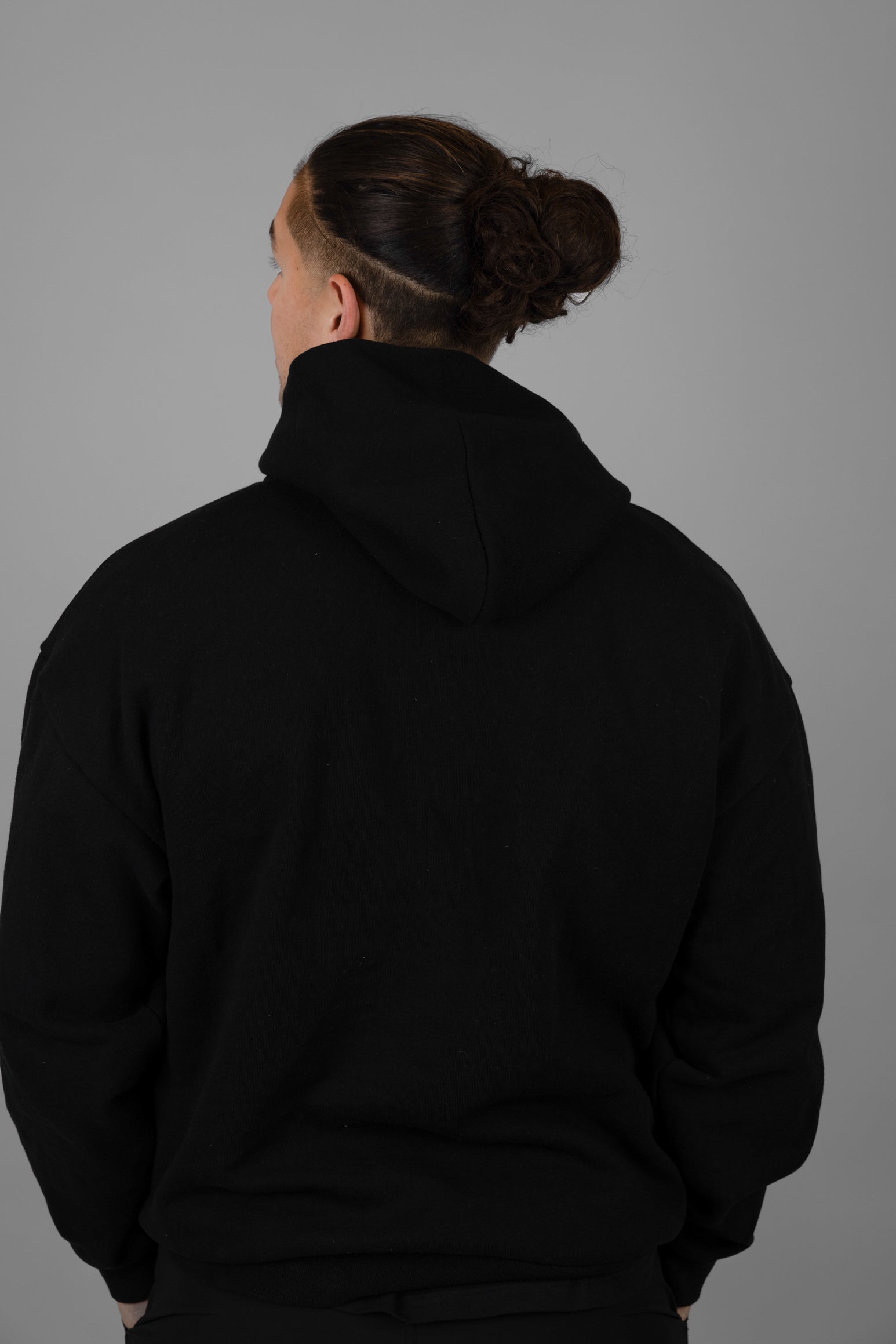 rear view of man in black hoodie