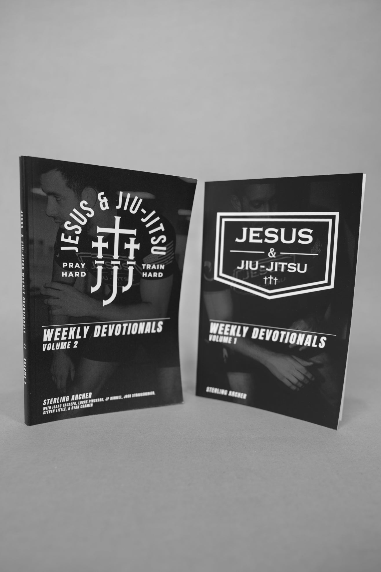 Two 'Jesus & Jiu-Jitsu Weekly Devotionals' books on a gray background